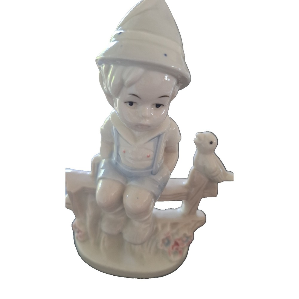 Vintage" Boy On A Fence Figurine"~ 6" Porcelain with Bird~~~QUALITY ITEM!!